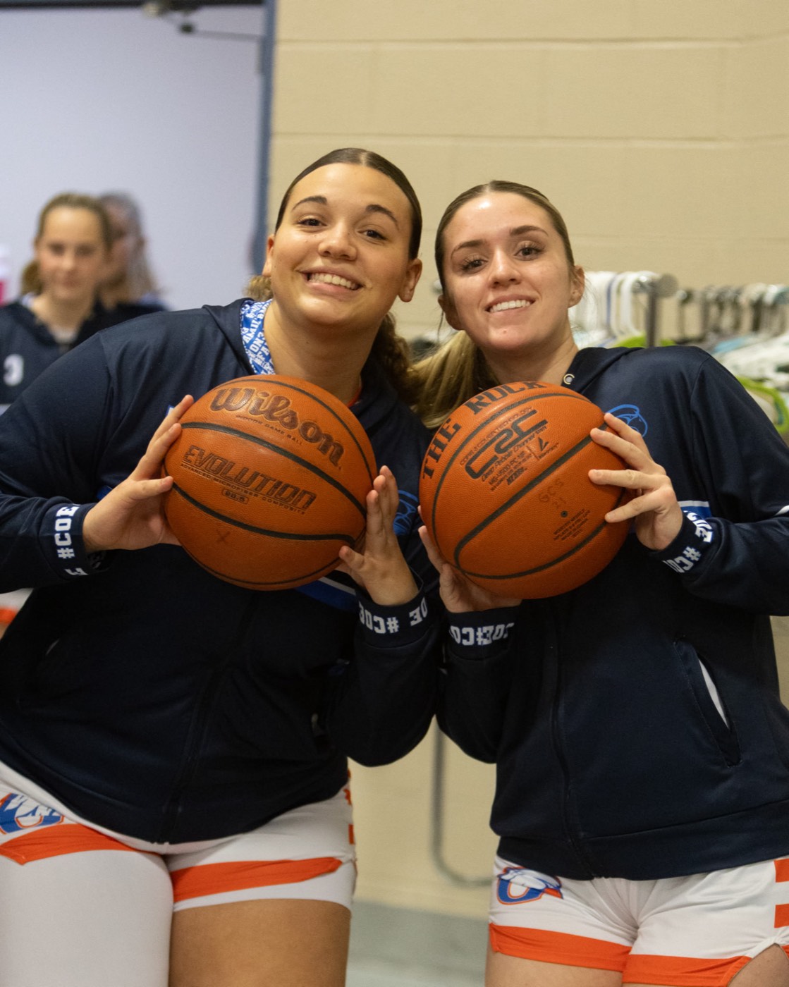 Players with basketballs